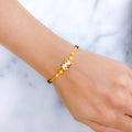 Floral Meenakari Barrel 22k Gold Bracelet