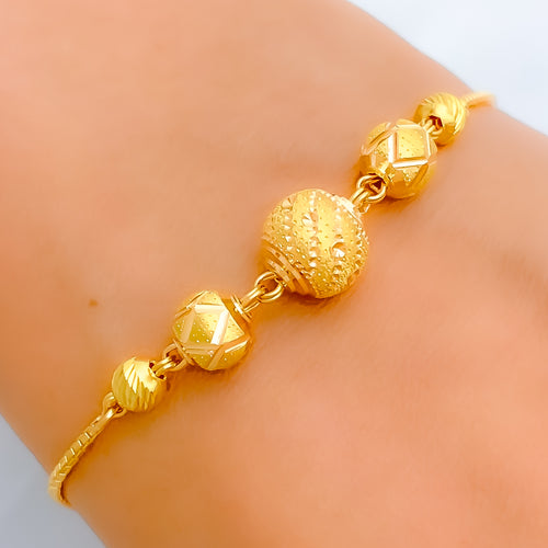 22k-gold-Classic Engraved Orb Bolo Bracelet  