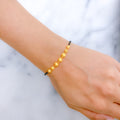 Alternating Black 22k Gold Bead Bracelet