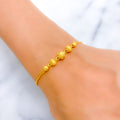 22k-gold-Glistening Striped Orb Bolo Bracelet 
