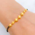 Alternating Black 22k Gold Bead Bracelet