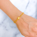 22k-gold-Dual Chain Striped Orb Bracelet