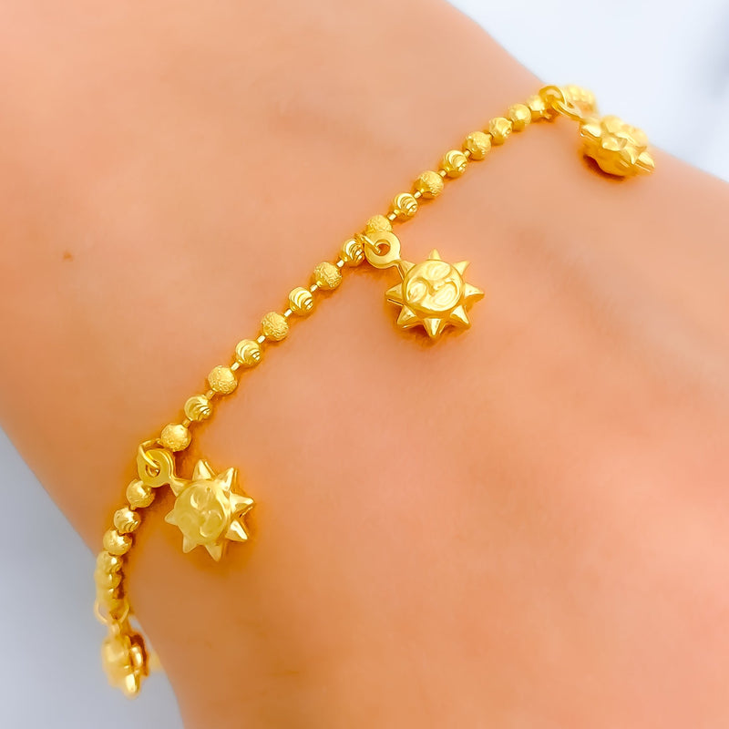 22k-gold-dangling-sun-charm-bracelet