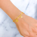 22k-gold-sleek-geometric-charm-bracelet