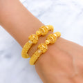 Fancy Floral Pipe 22k Gold Bangles