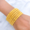 Flower Lined 22k Gold Bangles