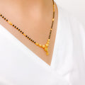 Reflective Black Bead 22k Gold Necklace