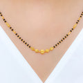 Sleek Black Bead 22k Gold Necklace