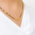 Sleek Black Bead 22k Gold Necklace