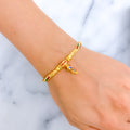 Vibrant Hanging 22k gold Flexi Bangle Bracelet