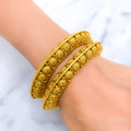 Unique Shell Accented Oxidized 22k Gold Bangles