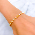 tasteful-decorative-22k-gold-pearl-bracelet