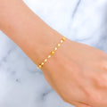 lightweight-graceful-22k-gold-pearl-bracelet