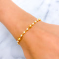 lightweight-graceful-22k-gold-pearl-bracelet