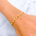 radiant-sleek-22k-gold-pearl-bracelet