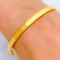 Thin Hallow 21K Gold Screw Face Bangle