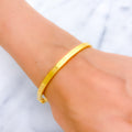 Thin Hallow 21K Gold Screw Face Bangle