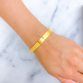 Thick Hollow 21K Gold Screw Face Bangle