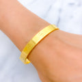 Thick Hollow 21K Gold Screw Face Bangle