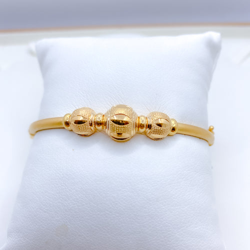 Charming Gold Bangle Bracelet