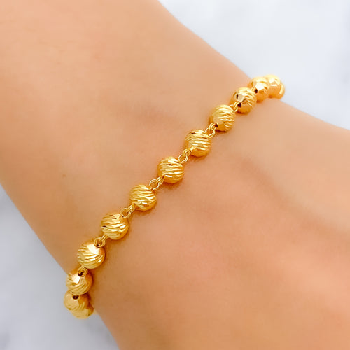 Classy Reflective 22k Gold Bead Bracelet