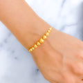 Sophisticated Dual Finish 22k Gold Orb Bracelet