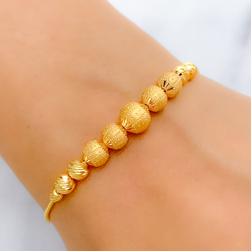 Sophisticated Dual Finish 22k Gold Orb Bracelet