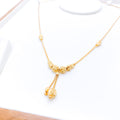 Upscale Sparkling Drop 22k Gold Necklace