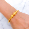 Graceful Three Bead Bangle 22k Gold Bracelet