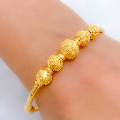 Radiant Wavy Bead Bangle 22k Gold Bracelet