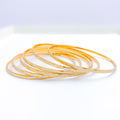 Ethereal Two-Tone Wave 22k Gold Bangles