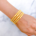 Elegant Leaf Accented 22k Gold Bangle Pair