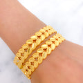 Elegant Leaf Accented 22k Gold Bangle Pair