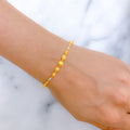 Striking Two-Tone 22k Gold Beaded Bracelet