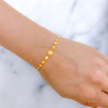 Upscale Two-Tone 22k Gold Beaded Bracelet