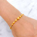 Upscale Two-Tone 22k Gold Beaded Bracelet