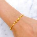 Charming Graduated 22k Gold Bead Bracelet