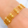 Chic Two-Tone Accented 22k Gold Wire Bracelet