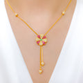 Elevated Green CZ Accented Flower 22k Gold Necklace