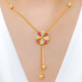 Elevated Green CZ Accented Flower 22k Gold Necklace