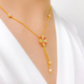 Elevated Green CZ Accented Flower 22k Gold Necklace