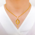 Upscale Oval Halo 22k Gold Pendant Set