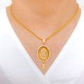 Upscale Oval Halo 22k Gold Pendant Set