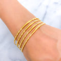 Dainty Evergreen Machine 22k Gold Cut Bangles