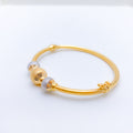 Elegant Triple-Orb 22k Gold Bangle Bracelet