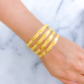 Bright Flower Accented 22k Gold Bangles