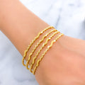 Fancy Timeless Wavy 22k Gold Bangles