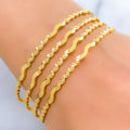 Fancy Timeless Wavy 22k Gold Bangles