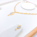 Upscale Heart Adorned 22k Gold CZ Set