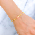 Rose Gold Accented 22k Gold Bangle Bracelet